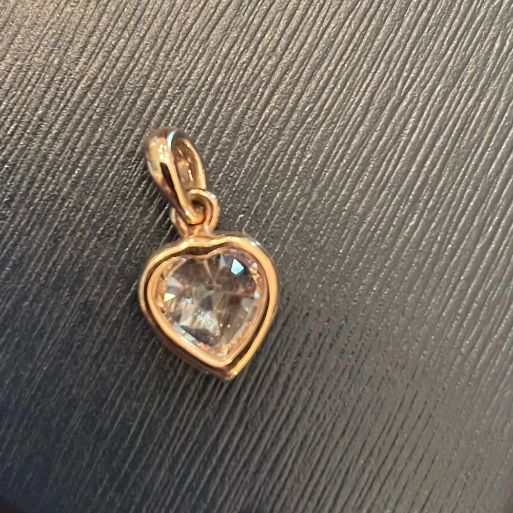 Cubic zirconia heart pendant in rose gold over sterling with 18” chain